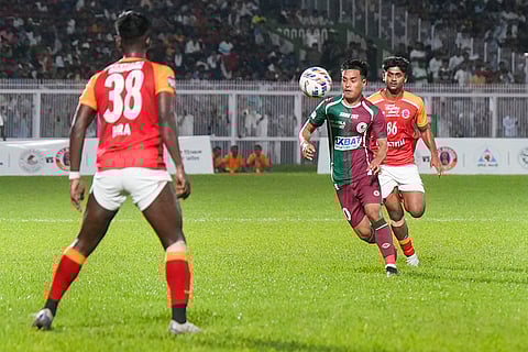 Mohun Bagan vs East Bengal exhibition match: Mohun Bagan and East Bengal (in red) players battle for the ball